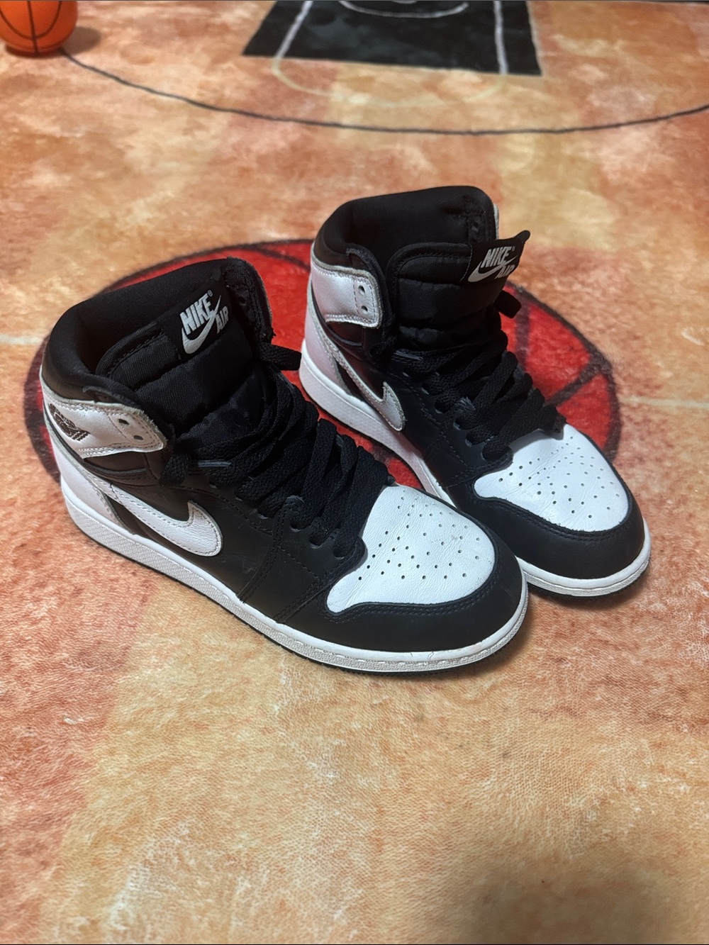 Nike Black & White High-Top Sneakers with Silver Accents